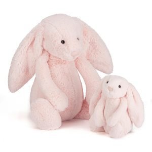 A super soft, baby pink bunny with flopsy ears, stitched eyes and a pinky little nose. Silky smooth with a chubby tummy, its a perfect cuddling partner!