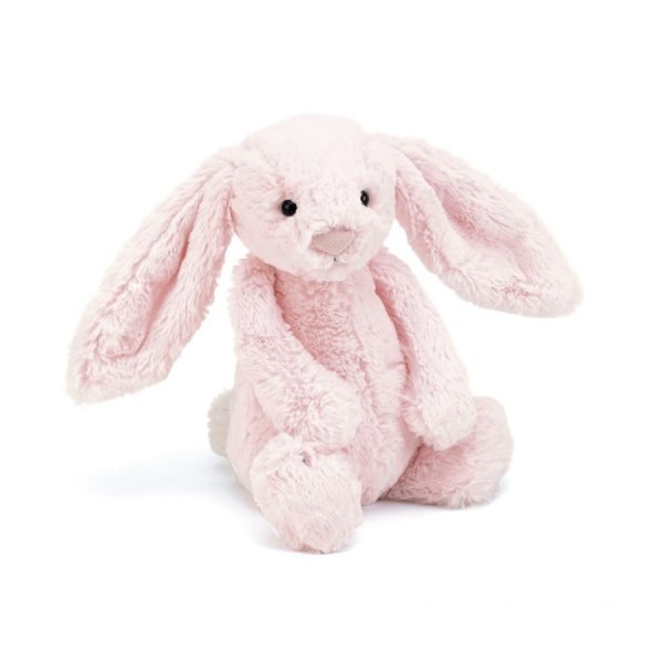 A gorgeous baby pink bunny with floppy ears, long arms and a squishable bobtail. Turn her upside down to hear her rattle.