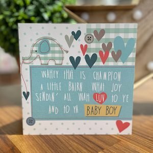 A new baby boy card with a cute blue elephant blue hearts and Wahey that is champoin a little bairn what joy sendin all wah luv to ye and to ya baby boy