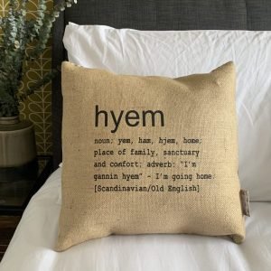 A North East inspired cushion made from hessian and backed with striped ticking. The cushion has a colloquial dictionary quote of what Hyem means.