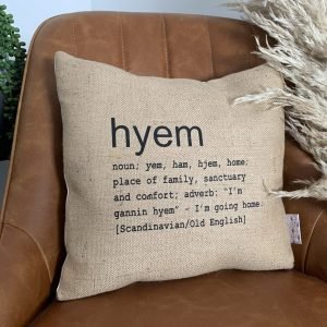 A North East inspired cushion made from hessian and backed with striped ticking. The cushion has a colloquial dictionary quote of what Hyem means.