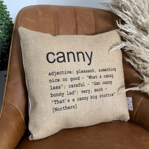 A North East inspired cushion made from hessian and backed with striped ticking. The cushion has a colloquial dictionary quote of what Canny means.