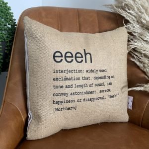 A North East inspired cushion made from hessian and backed with striped ticking. The cushion has a colloquial dictionary quote of what Eeeh means.