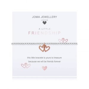 A sterling silver bracelet with two joined rose gold hanging hearts on a white card with meaningful comment written on the card