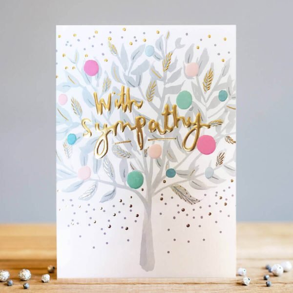 A sympathy card with with sympathy on the outside in gold embossed text but blank on the inside for your own special message. Illustrated with a grey tree