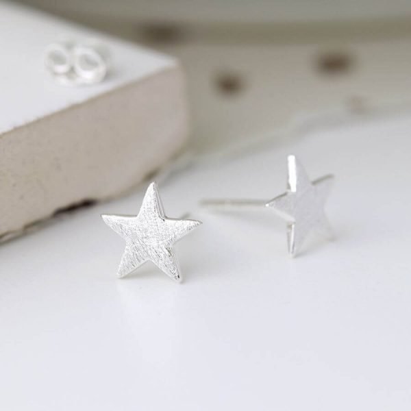 A pair of sterling silver star stud earrings with brushed textured stars