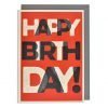 A cream card with red background and the words Happy birthday with overlapping letters in white and black print which is embossed.