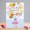 A greetings card illustrated with a girl holding a huge bunch of balloons with the words to a wonderful niece