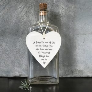 A lovely cream porcelain heart to hang in the home with the words, A friend is one of the nicest things you can have and one of the nicest things you can be