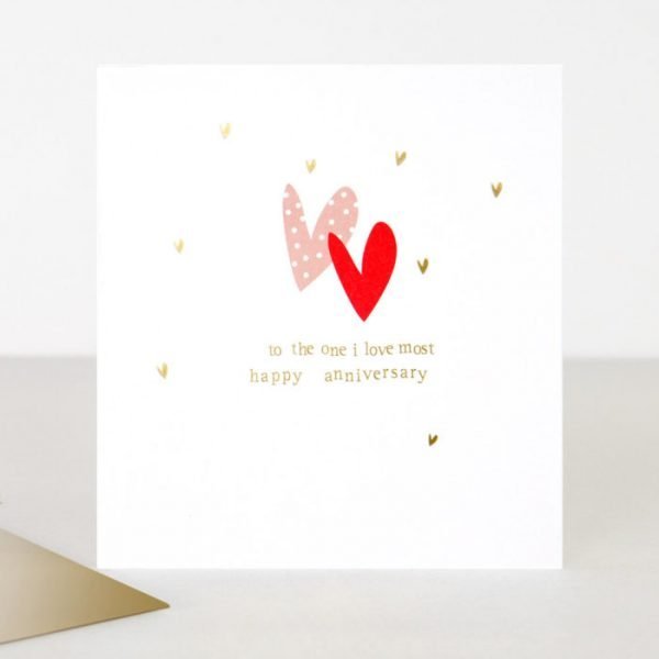 A designer anniversary card from Caroline Gardner. A white card 2 love hearts and to the one i love the most happy anniversary in gold foil lettering