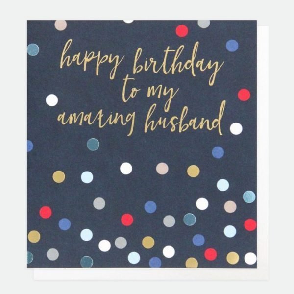 A designer birthday card from Caroline Gardner for your Husband. A navy blue card with blue whilte gold and red dots and Happy Birthday to my amazing Husband in gold writing.