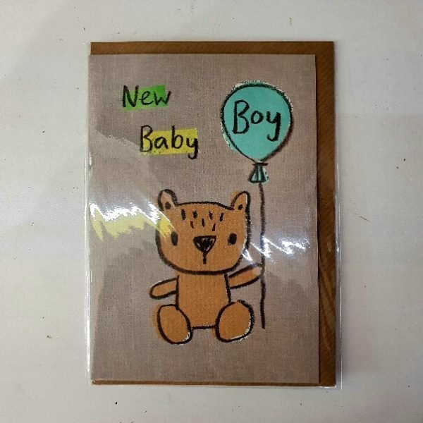 A new baby boy card with a crayon drawing of a cute bear holding a blue balloon