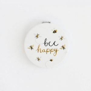 Printed leather look round pocket mirror with bee happy and lots of little bees. Hinged opening and magnetic close . 2 mirrors one magnifying