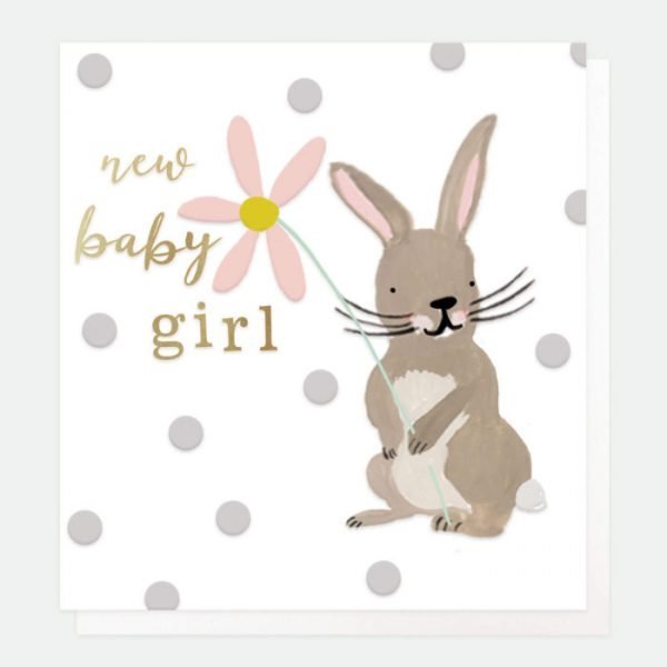 A designer card from Caroline Gardner for a new baby girl. A white card with pale grey dots and a little rabbit holding a pink flower and new baby girl in gold lettering