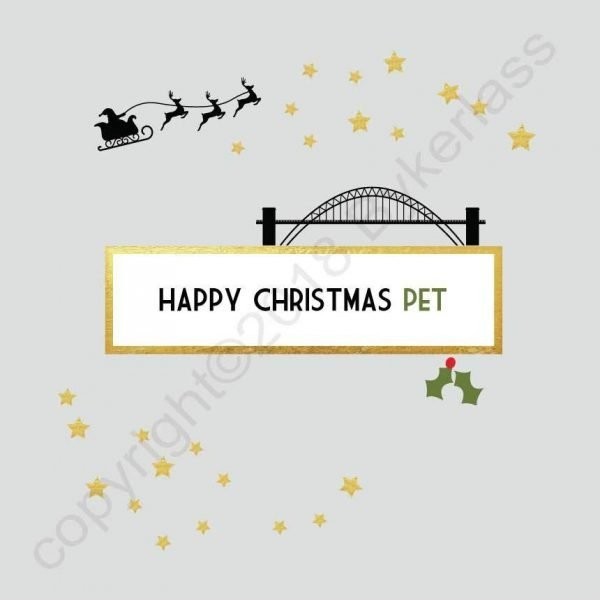 A winter white card with gold stars and a silhouette of santa in his sleigh flying over the Tyne bridge and the words Happy Christmas Pet