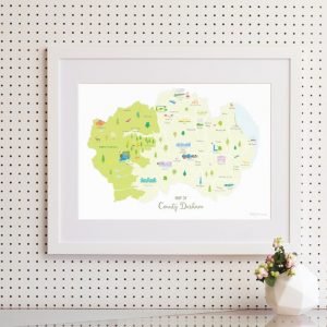 An illustrated map of County Durham A3 print featuring landmarks and areas throughout the county. Shown in a white frame with a white mount