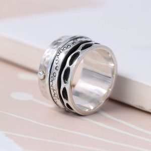 Hand crafted spinning ring made from fine quality sterling silver with decorative edges and double silver moving bands