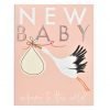 A new baby card in pink with a stork carrying a bundle