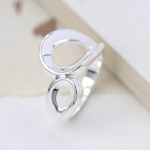 A contemporary chunky silver ring with a double loop