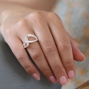 A contemporary chunky silver ring with a double loop
