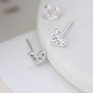 A pair of silver crystal heart earrings. Heart shape stud earrings with cubic zirconia crystals.