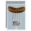 A card with an image of a sausage on a fork and the words you clever sausage well done