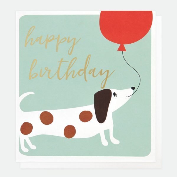 A birthday card from Caroline Gardner with a sausage dog holding a big red balloon