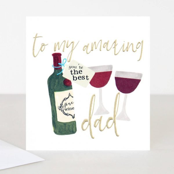 A birthday card with to my amazing dad in gold foil hand written text and an illustration of red wine bottle and two glasses with a label on the bottle that says You're the best. A Caroline Gardner card