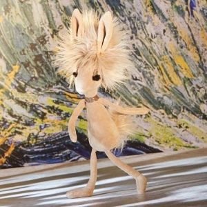 A crazy cuddly toy hare from Jellycat toys. with huge fluffy hair and a spakly choker. Her lovely long eyelashes finish off her glamorous look.