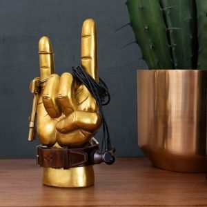 A resin model of a hand in a rock salute. It can be used to keep your accessories, watch keys earphones on or just as an ornament