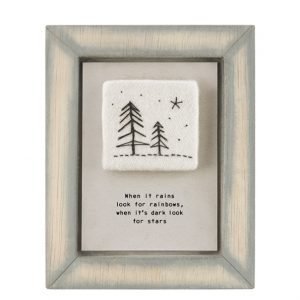 A sweet little wooden framed picture which is made from a felt square with an embroidered image of trees and stars and the wording 'When it rains look for rainbows, when its dark look for stars,' printed on it.