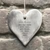 A grey rustic hanging heart from East of India with the wording 'Even when they're miles apart, good friends are always close at heart'