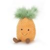 A pineapple soft toy from the Jellycat amuseable range. A yellow pineapple with a cute smiley face and a fluffy green mop top and dangley legs.
