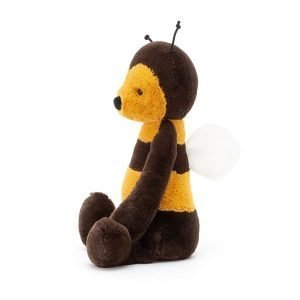 A side view of the Jellycat cuddly toy Bashful bee
