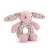 A beautiful tulip pink and pink floral fabric bunny with a circular body for baby to grab. The bunny rattles