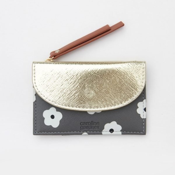 A stunning daisy design cardholder and coin purse from British designer Caroline Gardner. WIth a grey background, white flower with a black centre and with a gold envelope top to it.