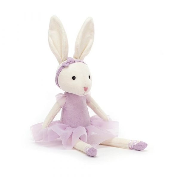 A cream velveteen ballerinaballerina bunny soft toy in a lilac tutu and matching headband