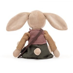 A beige bunny soft toy wearing a mustard jumper, deep rose waistcoat and holly-green bloomers and a satchel.