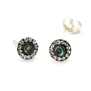 A pair of silver stud earrings with a centre made from abalone shell and finished with tiny crystals around the edges.