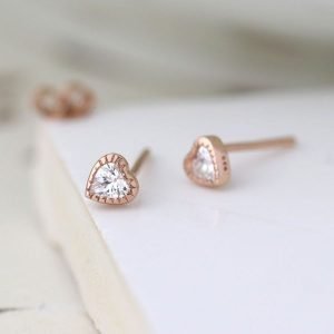 A lovely pair of sterling silver rose gold plated heart earrings with a crystal centre.