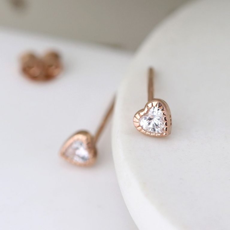 A lovely pair of sterling silver rose gold plated heart earrings with a crystal centre.