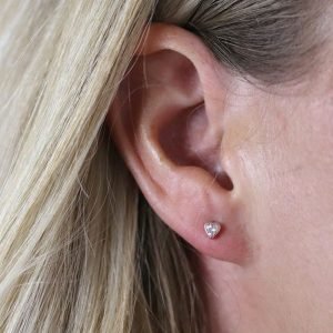 A lovely pair of sterling silver rose gold plated heart earrings with a crystal centre.