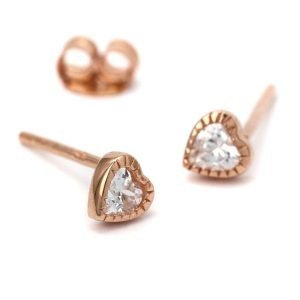 A lovely pair of silver earrings which are rose gold plated with a crystal centre.