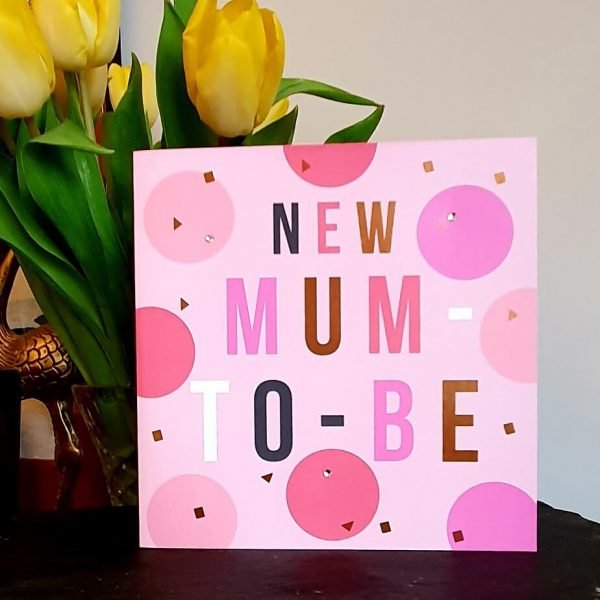 A lovely card for a new mum to be to say congratulations. A pink card with big ping dots and little crystals