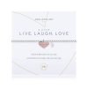 An elasticated bracelet from Joma with round silver plated brass beads and a rose gold heart pendant stamped with live laugh love from Joma. Presented on a white card printed with A little Live Laugh Love - wear this little charm on your way a reminder to live, laugh and love every day