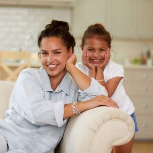 A silver plated bead stretch bracelet with an embellished heart charm from Joma Jewellery. The bracelet is presented on a pink coloured card with the wording A Little Happy Mother's Day printed on it.