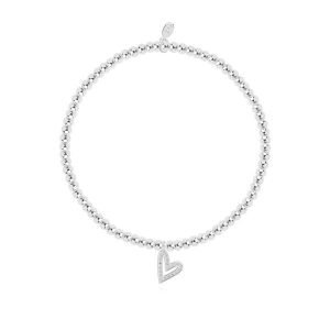 A silver plated bead stretch bracelet with an embellished heart charm from Joma Jewellery. The bracelet comes on a white card with a confetti design and the words A Little Fabulous Friend printed on it.