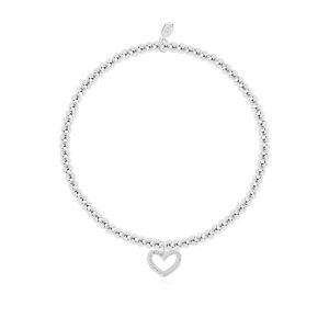 A silver plated bead stretch bracelet with crystal embellished heart charm, from Joma jewellery. The bracelet is presented on a square card with a lovely colourful confetti design.