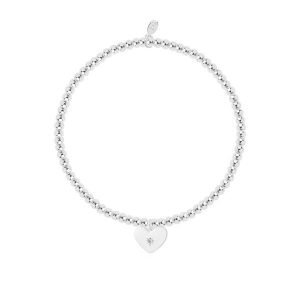 A silver plated stretch bracelet from Joma Jewellery which has a silver heart with a small crystal in the centre of it. The bracelet is on a square card which has the words A little wonderful Great Grandmother printed on it.