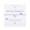 A children's elasticated silver plated beaded bracelet on a white card from Joma jewellery. The bracelet has a silver double heart charm and the card reads Darling Daughter - this little bracelet is yours to treasure because you're the best daughter ever. Comes with a gift card for your own message and wrapped in a gift bag tied with a satin ribbon